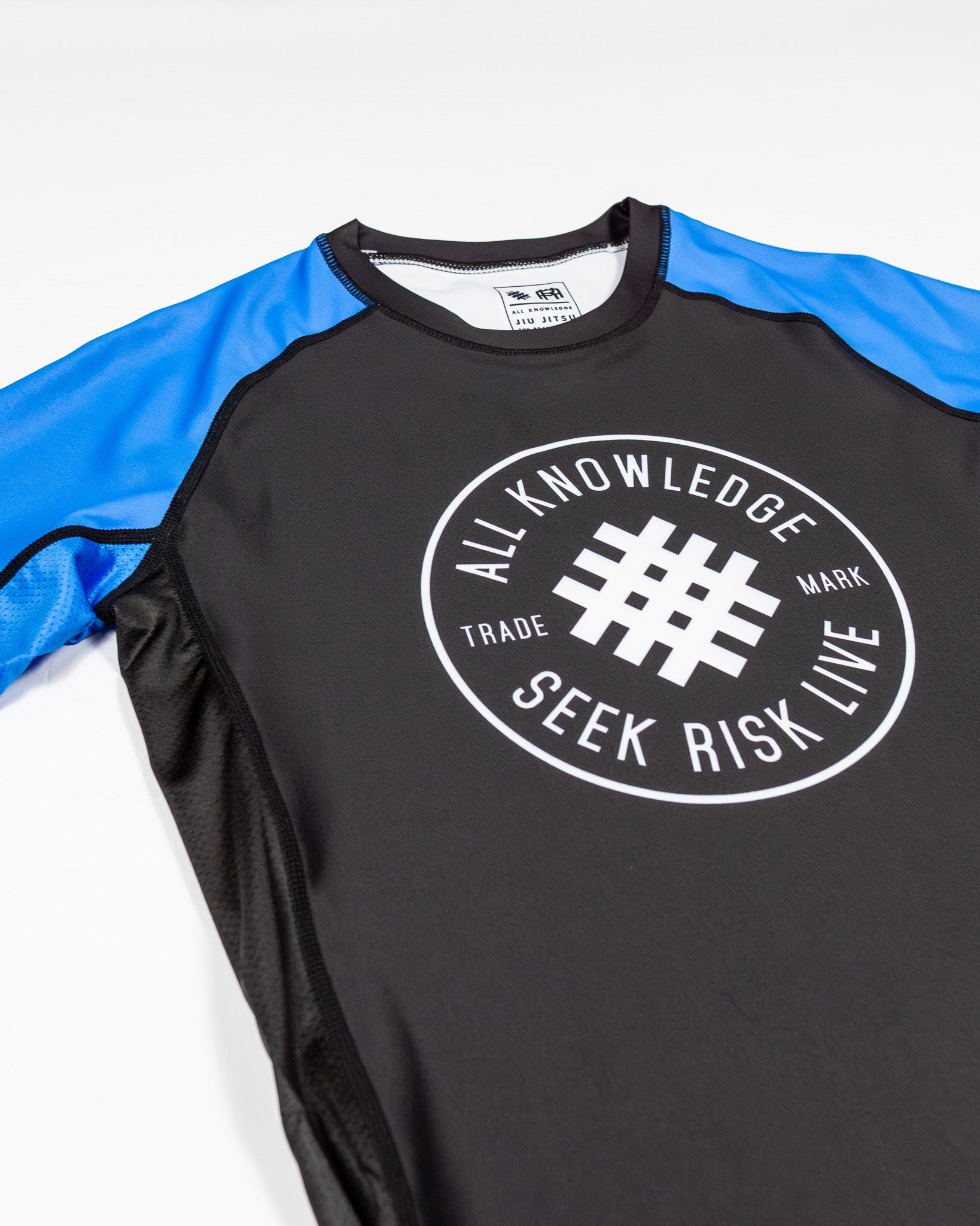 Black and blue short-sleeve jiu-jitsu rashguard