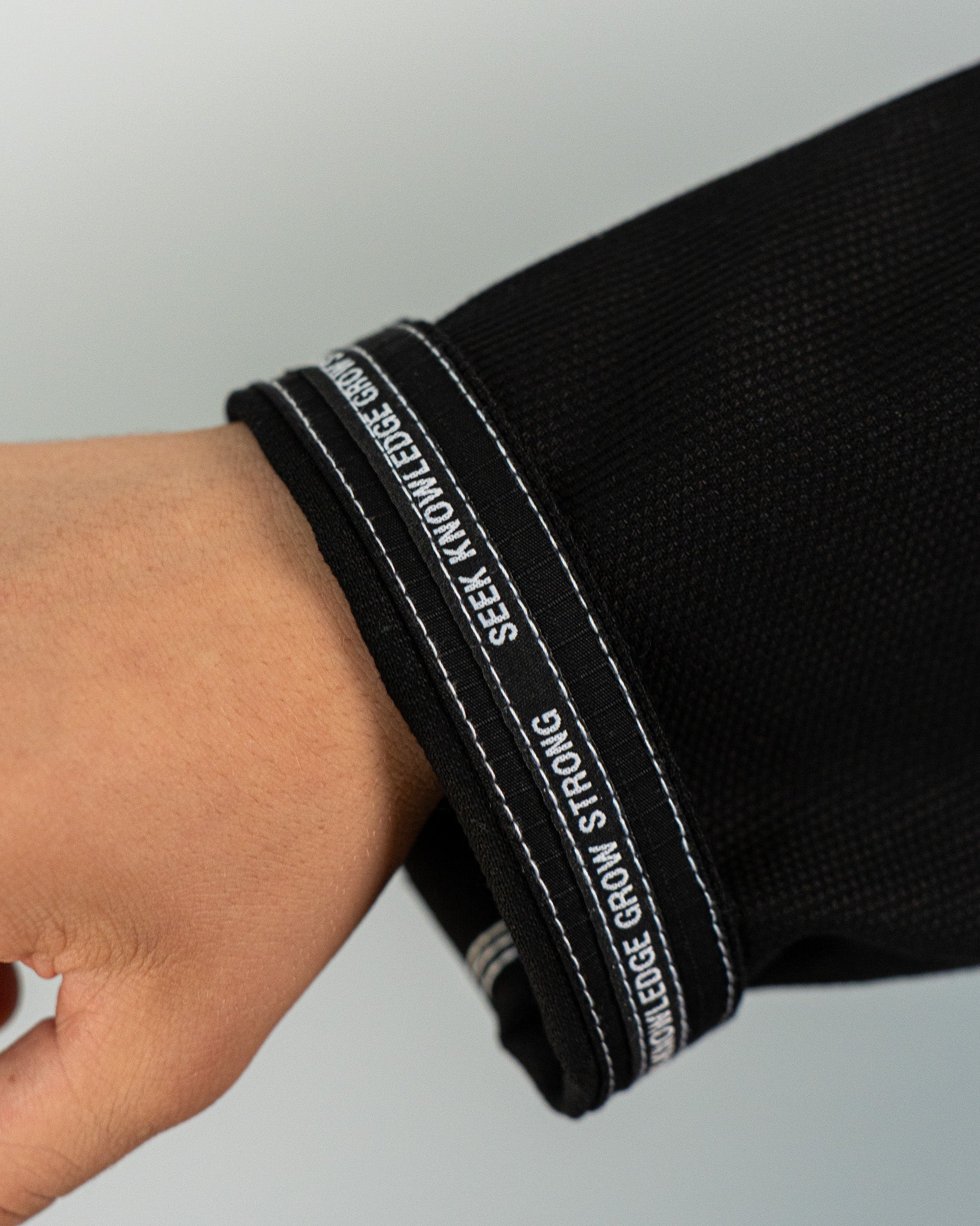 Seek Knowledge Grow Strong BJJ Black Gi