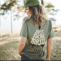 green t-shirt with 'Do It For The Thrill