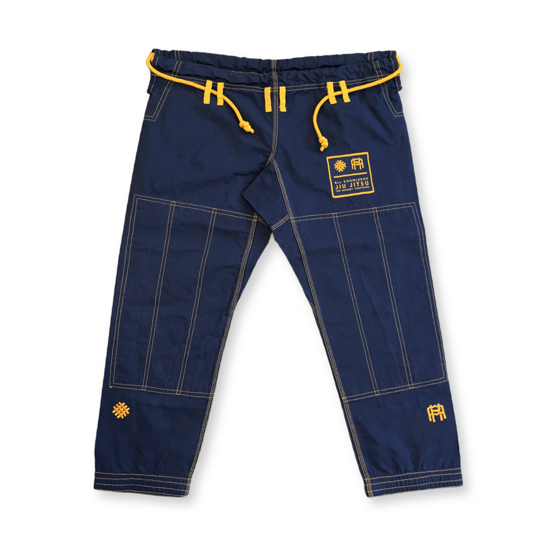 Navy blue jiu-jitsu Gi pants with yellow accents on a white background